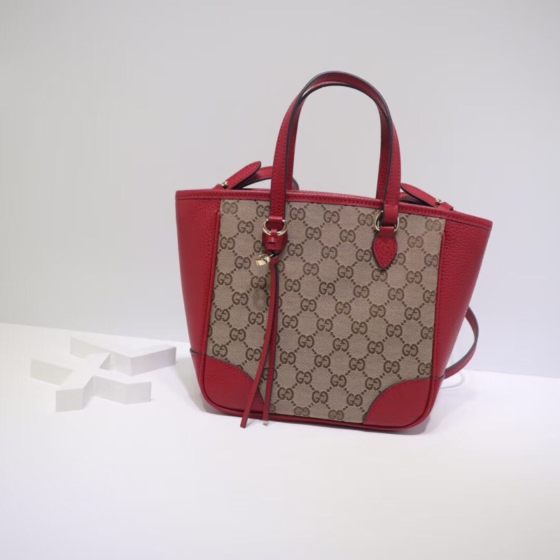 G*u*i shopping bags